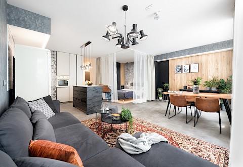 Návrh interiérového designera - obývací pokoj v industriálním stylu